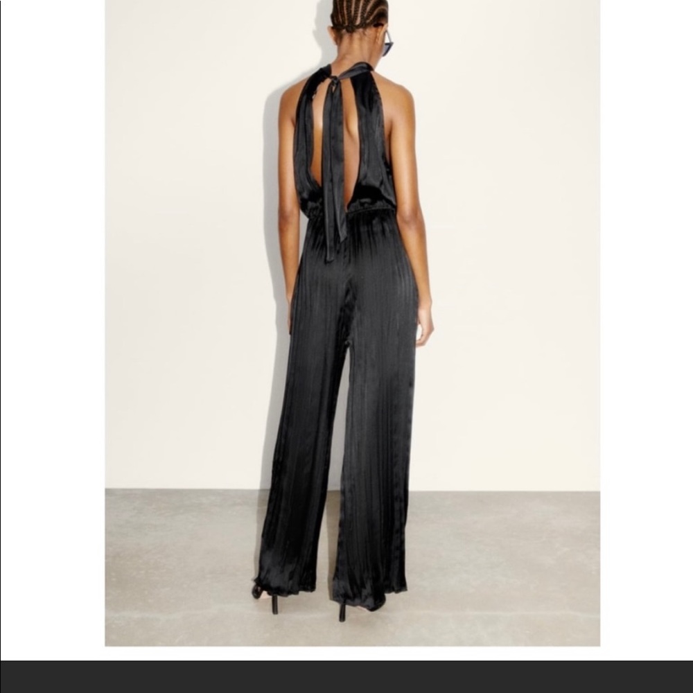 Satin ruffled jumpsuit • Zara